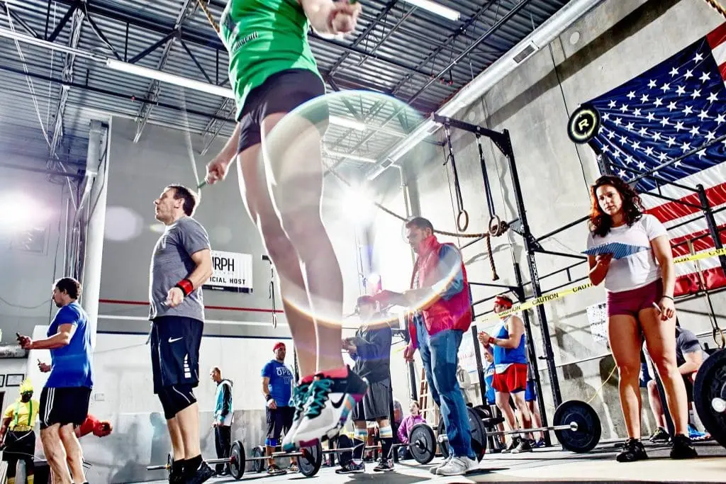 A group of Bull Run CrossFit members working out together.